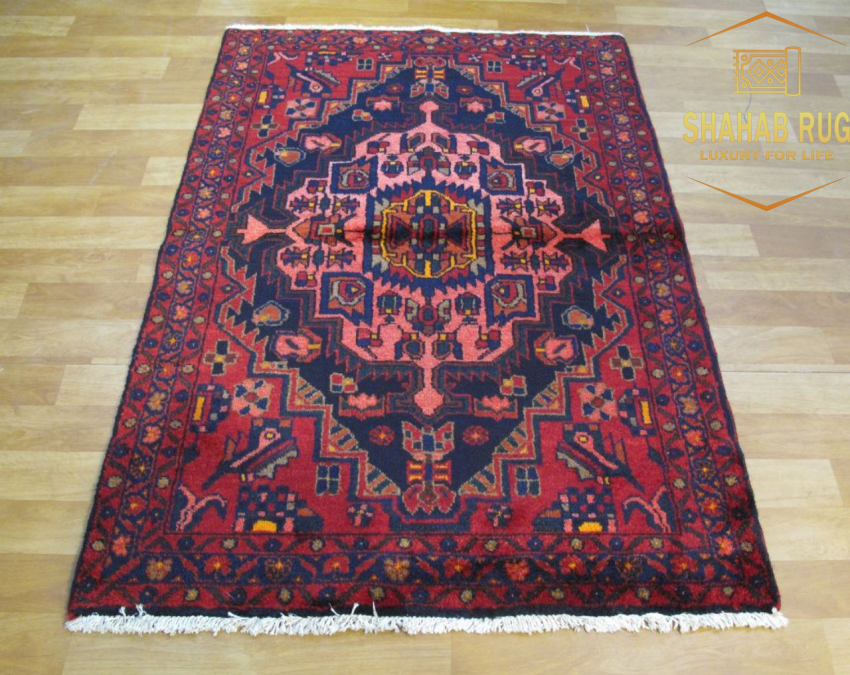 Traditional Borujerd rug from Iran, featuring geometric patterns and a rich, durable wool pile