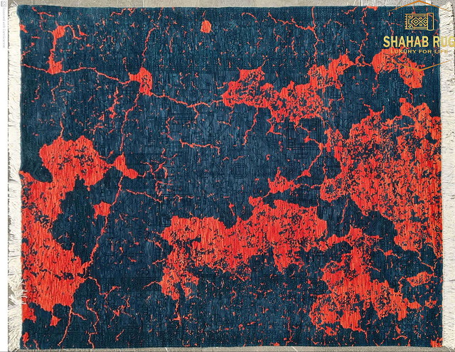 Handwoven Tabriz rug with intricate medallion design in rich red and navy tones
